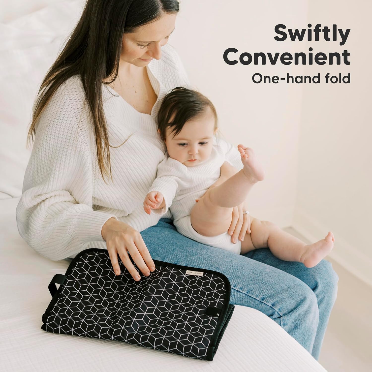 KeaBabies Swift black geometric travel changing pad with one-hand fold