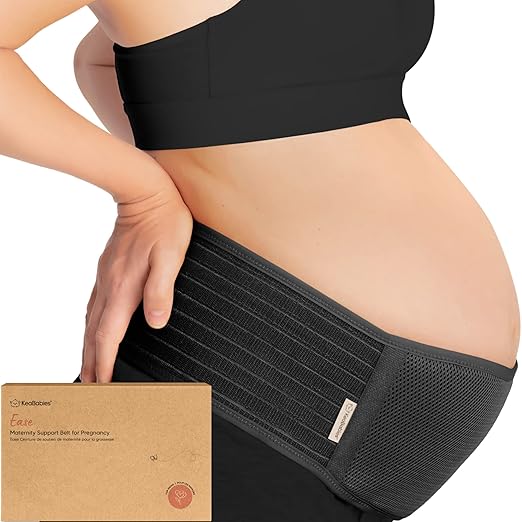 KeaBabies EASE maternity belly support belt in black, worn over pregnant abdomen