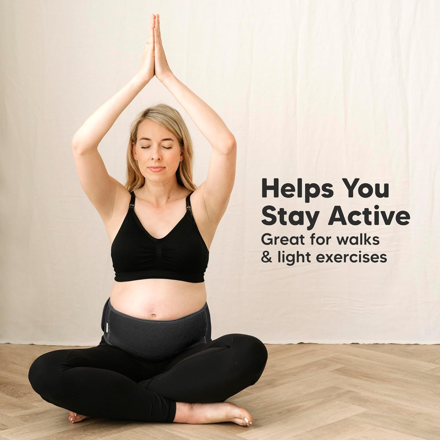 KeaBabies EASE black maternity belly support band for pregnancy worn during exercise