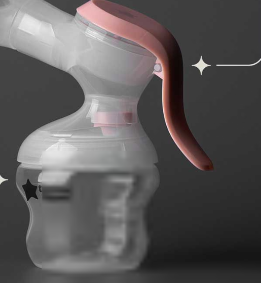 Tommee Tippee manual breast pump with pink handle and collection bottle