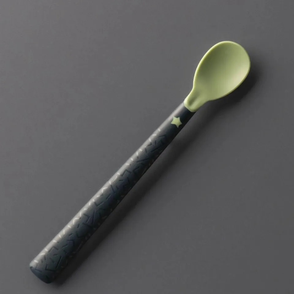 Tommee Tippee Softee Weaning Spoon with lime green bowl and dark handle