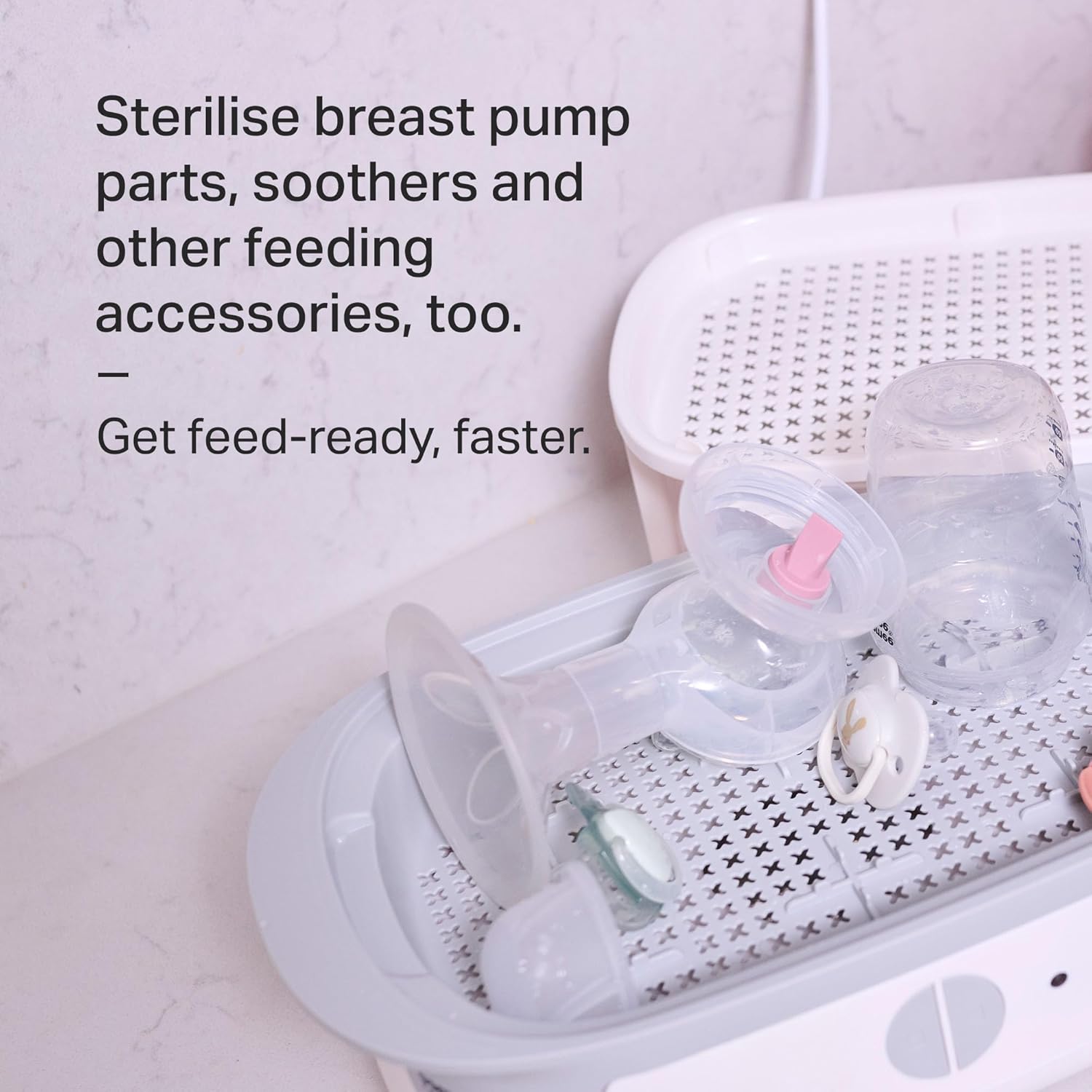 Tommee Tippee white electric steam steriliser with feeding accessories inside