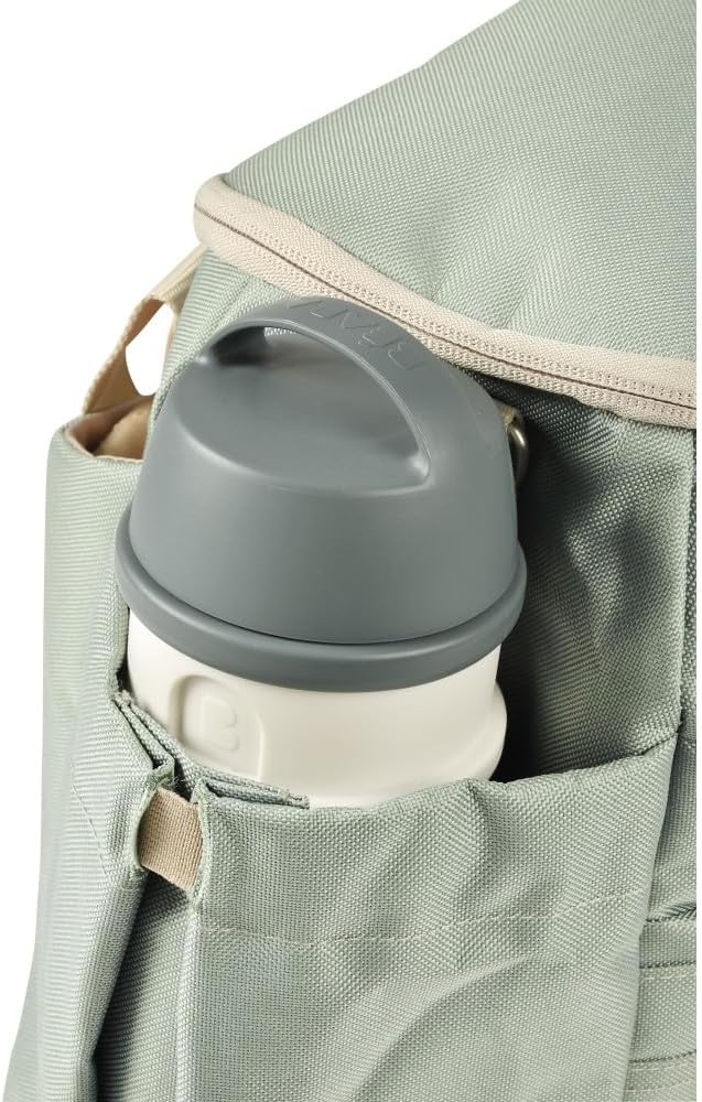 Béaba Sydney II changing bag in leaf green with storage pocket and handles