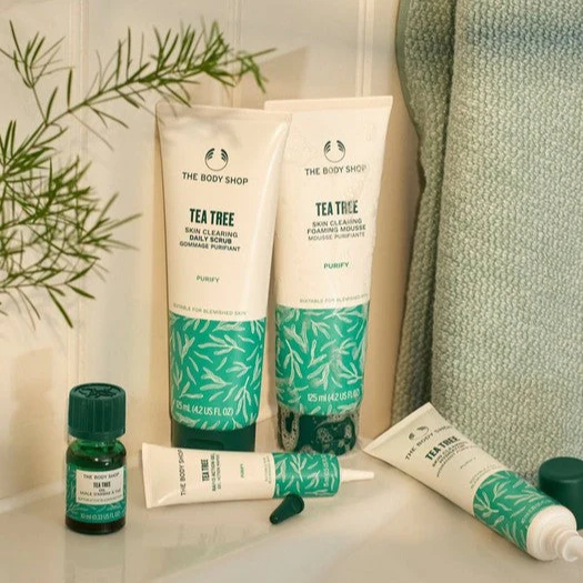 The Body Shop Tea Tree Skin Clearing Hydrator skincare set with bottles and tubes