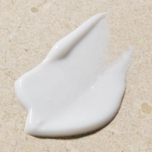 The Body Shop Vitamin C Glow Revealing liquid peel exfoliant texture sample