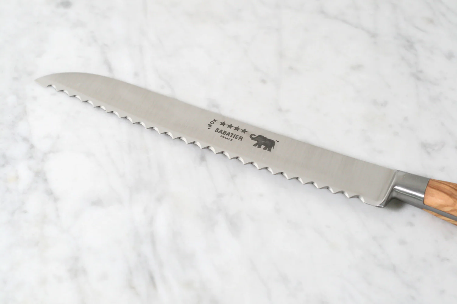 Sabatier bread knife with serrated stainless steel blade and wooden handle