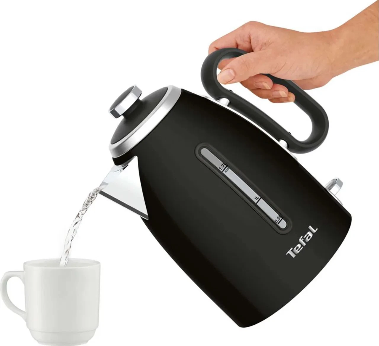 Tefal Retra black 1.7L kettle 3000W pouring into white cup