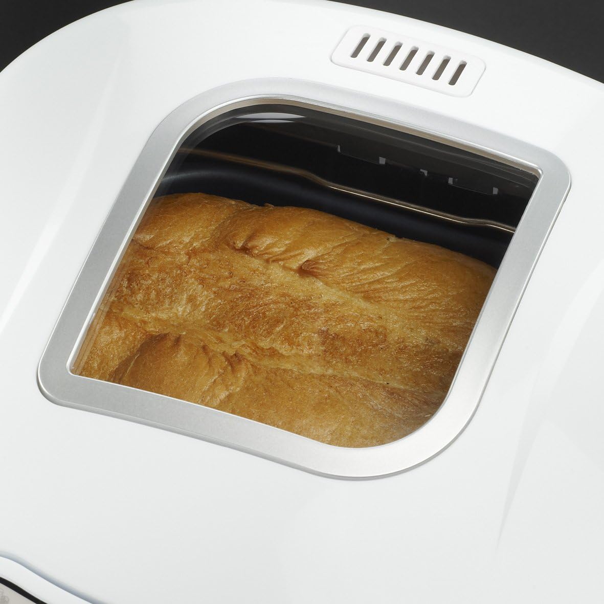 Russell Hobbs classic fast bake breadmaker 18036 white with baked loaf
