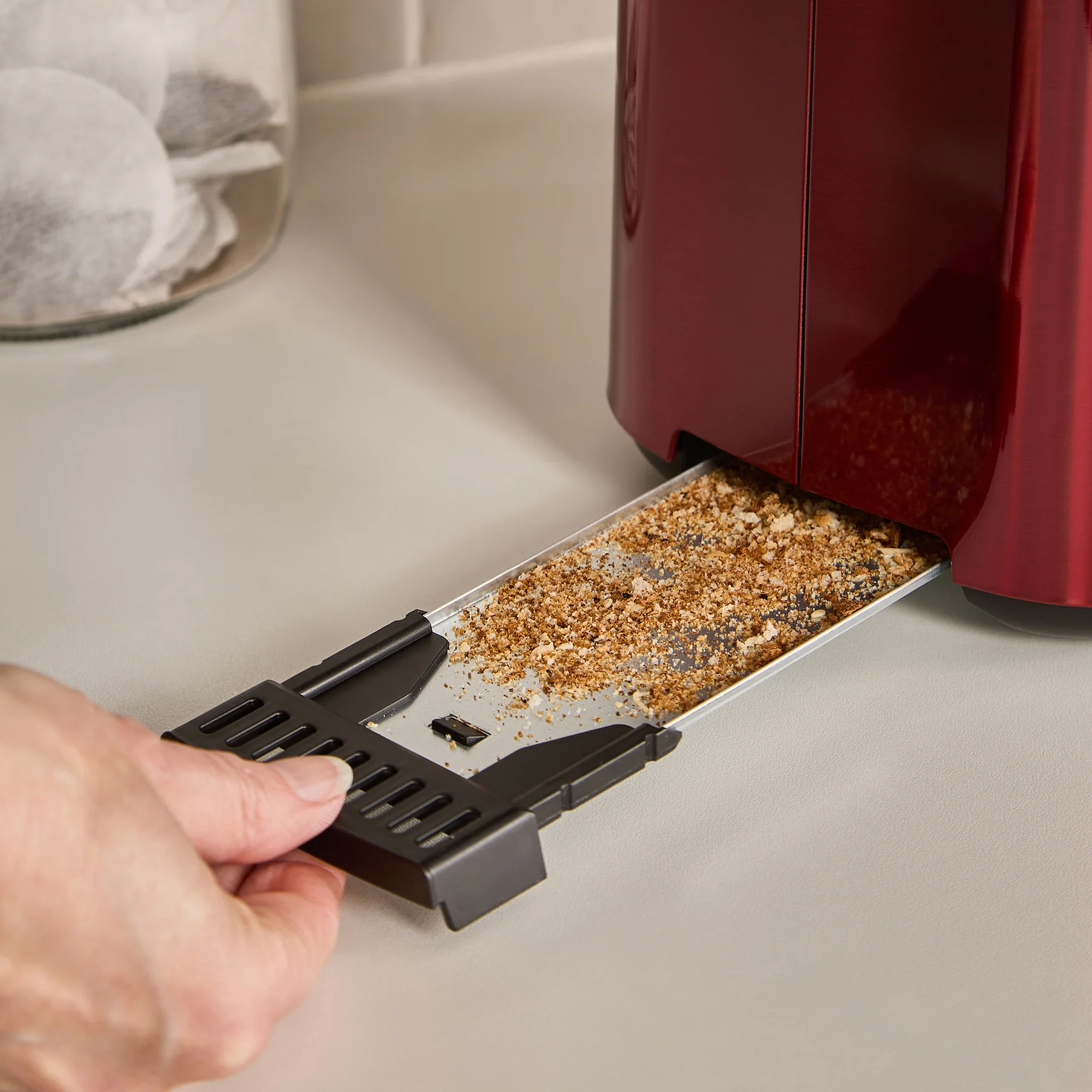 Morphy Richards Equip brushed burgundy 2 slice toaster with crumb tray open