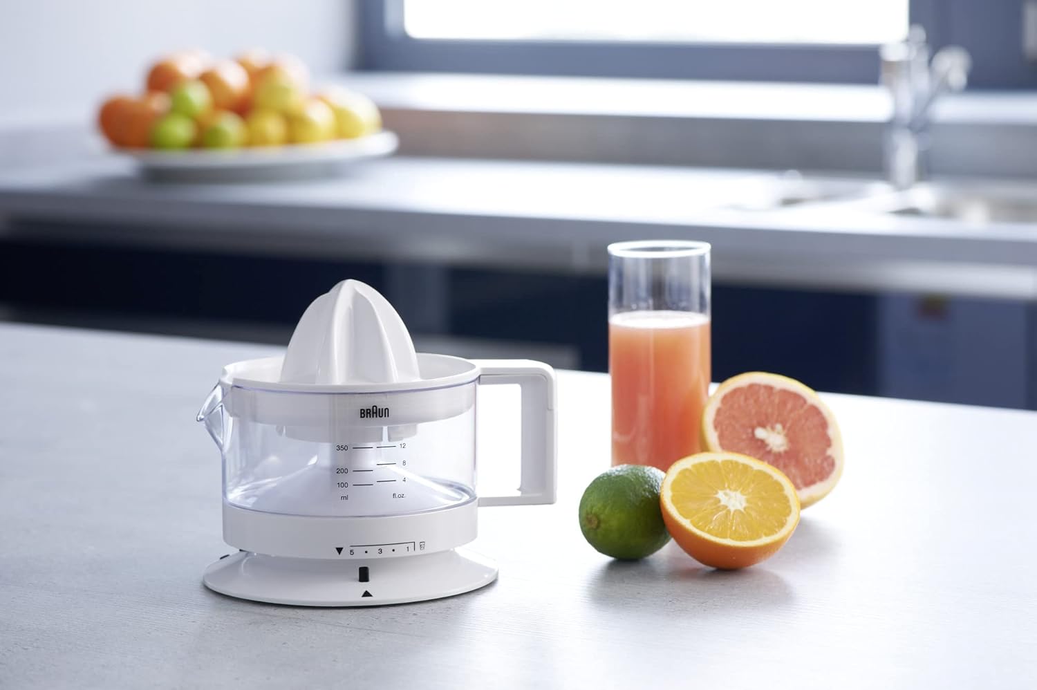 Braun white citrus press with 350ml capacity and auto start stop function