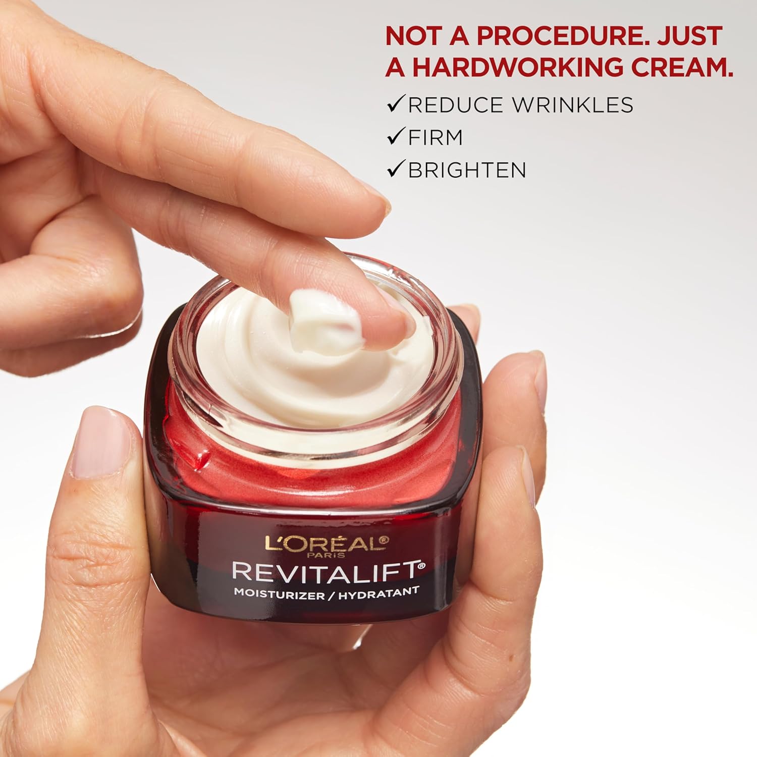 L'Oreal Paris Revitalift Triple Power anti-aging face moisturiser cream jar
