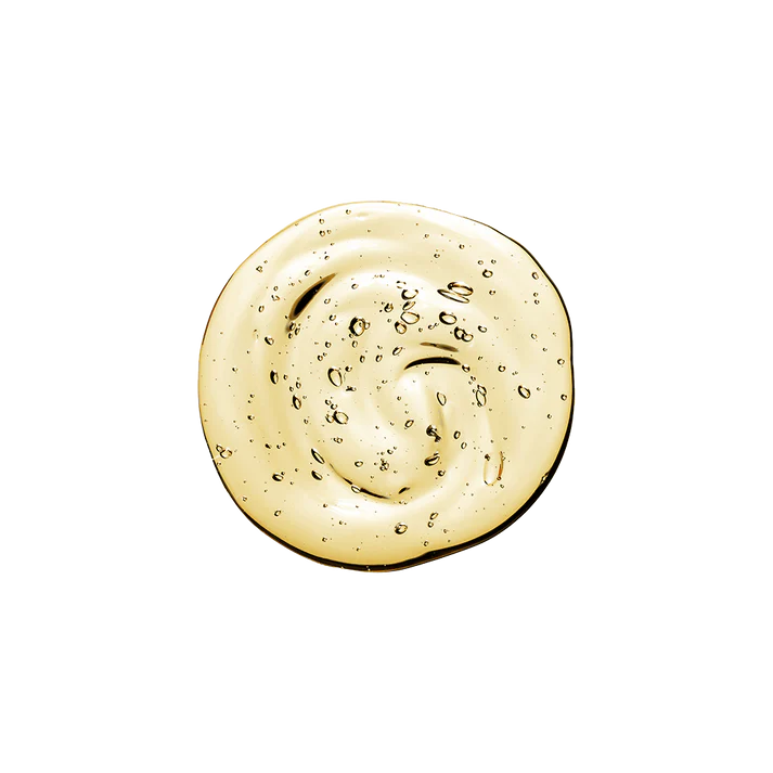 Makari Exclusive Tone Boosting Body Glycerin, golden liquid with droplets