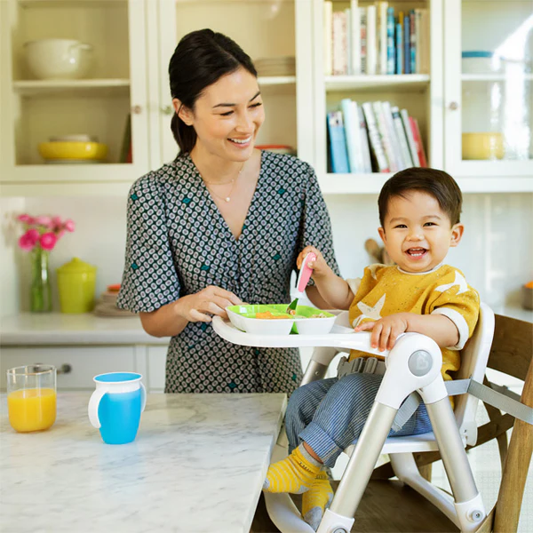 Munchkin Raise toddler fork and spoon set with white tray for 12 months plus