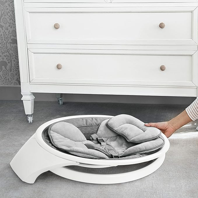 Munchkin Bluetooth enabled baby swing with grey seat cushion, white frame