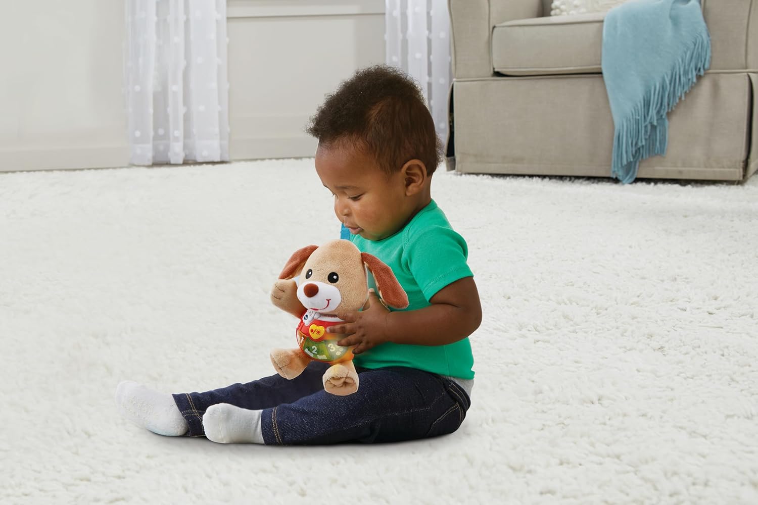 VTech Little Singing Puppy soft toy with tan and brown plush fur