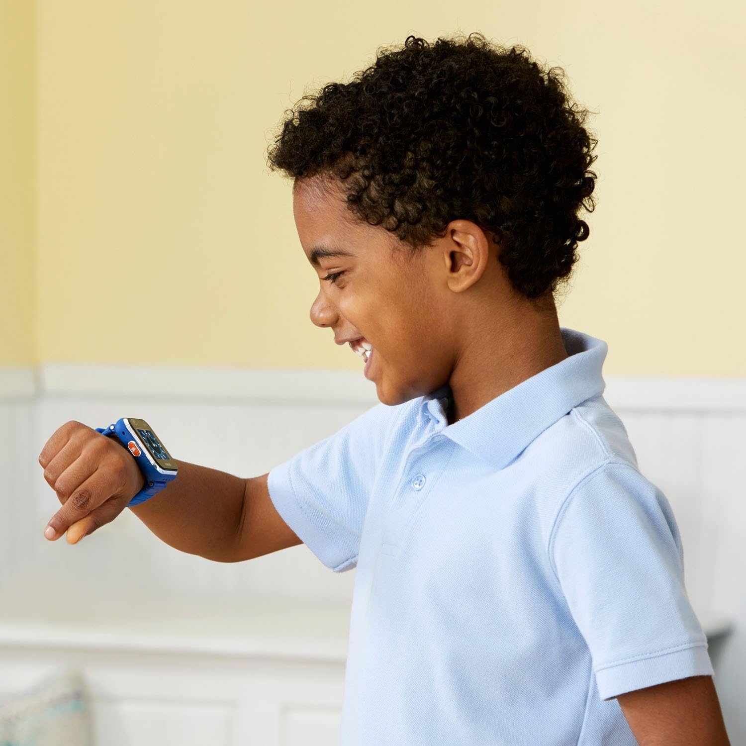 VTech KidiZoom Smartwatch DX2 blue digital watch on child's wrist