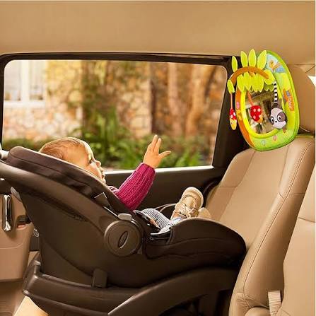 Munchkin Brica Swing In-Sight car mirror with green activity toy attachment