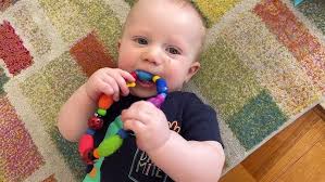Nuby Bug-a-Loop Teether with colourful loops for babies three months plus