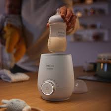 Philips Avent SCF355/00 Quick Bottle Warmer with bottle being lifted