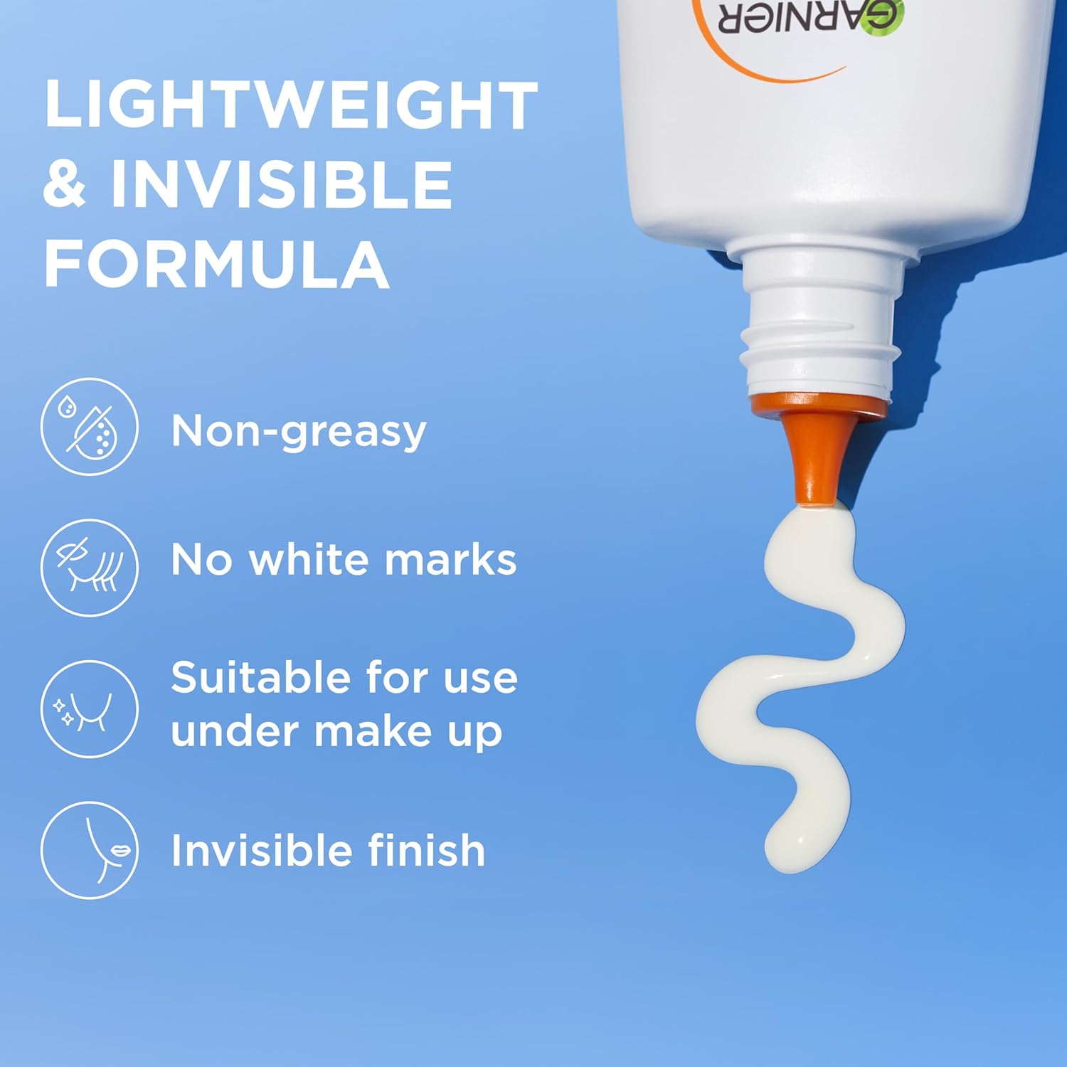 Garnier Ambre Solaire SPF 50+ UV Protection Fluid with orange pump dispenser bottle