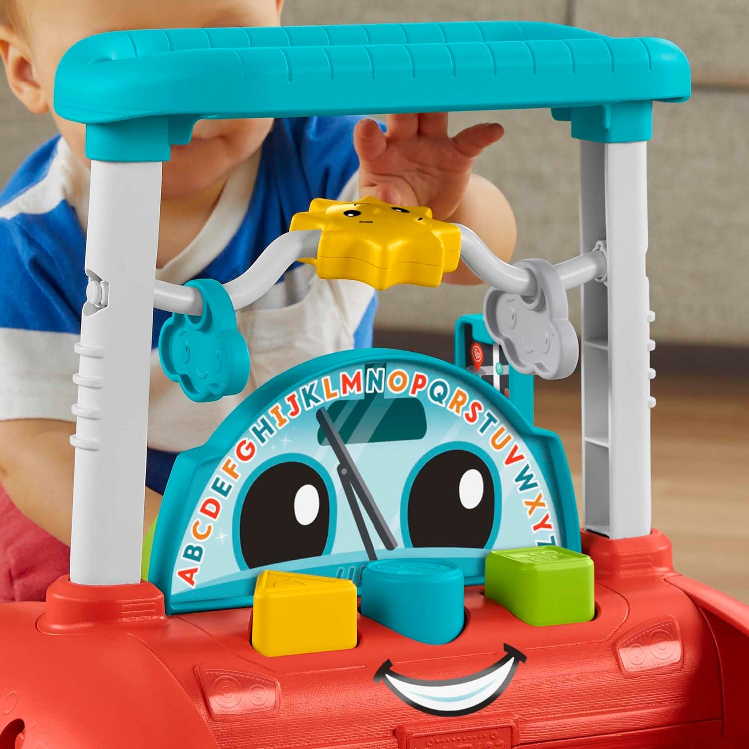 Fisher-Price turquoise two-sided Steady Speed Walker with learning activities