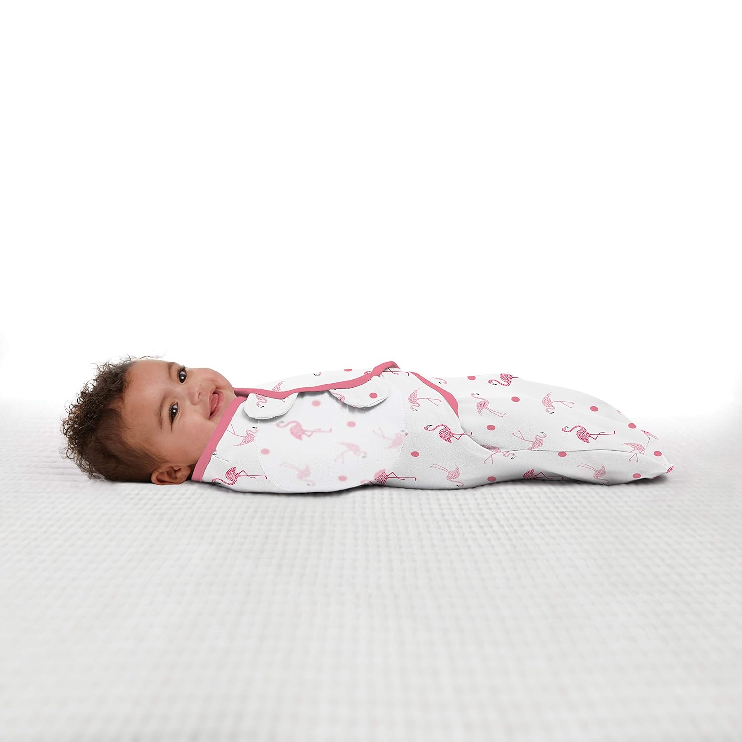 SwaddleMe Original Swaddle in white with pink flamingo print design