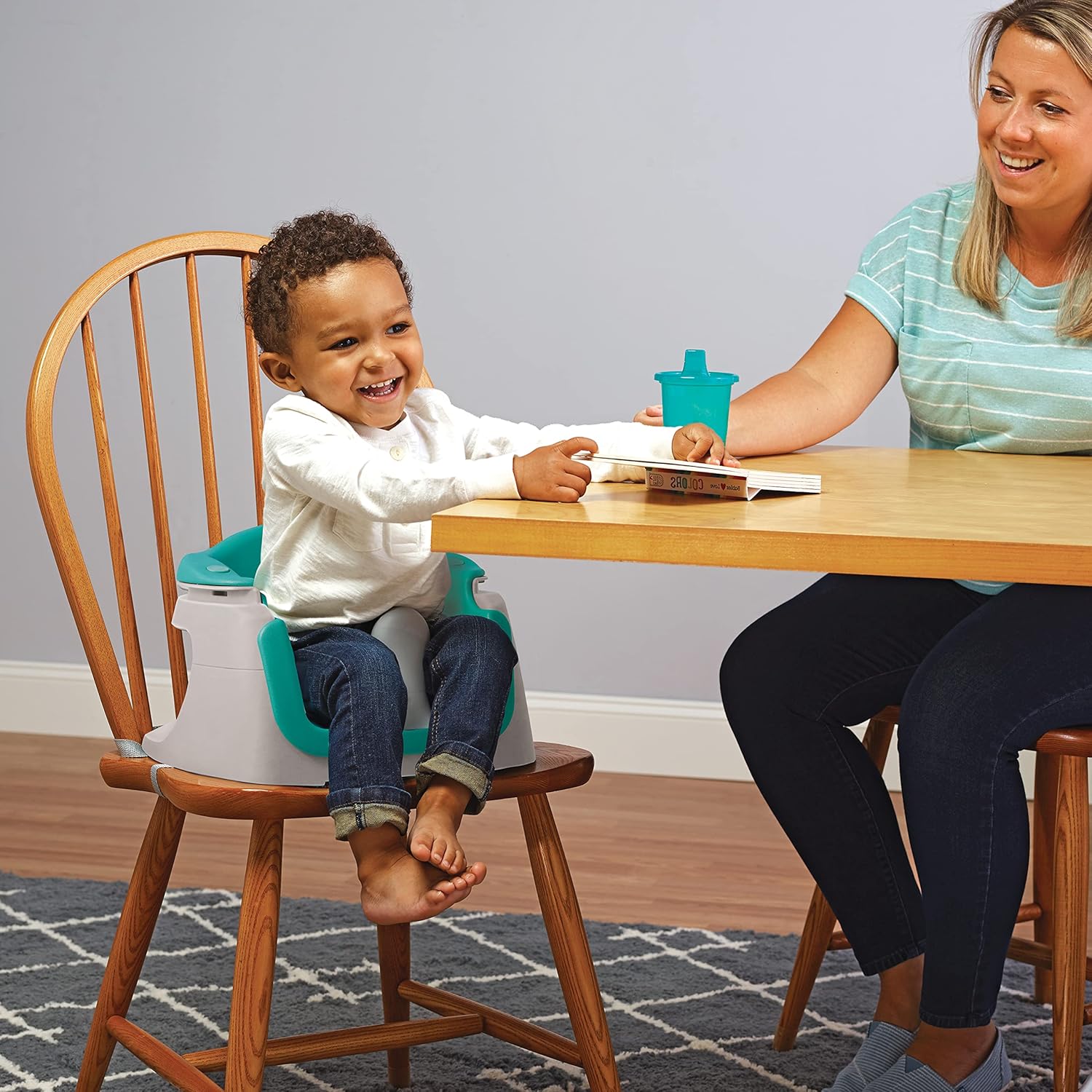 Summer Infant 4-in-1 SuperSeat teal and white portable booster seat