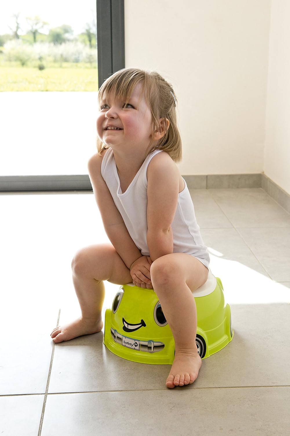 Safety 1st Fast and Finished Potty in lime green with smiley face design