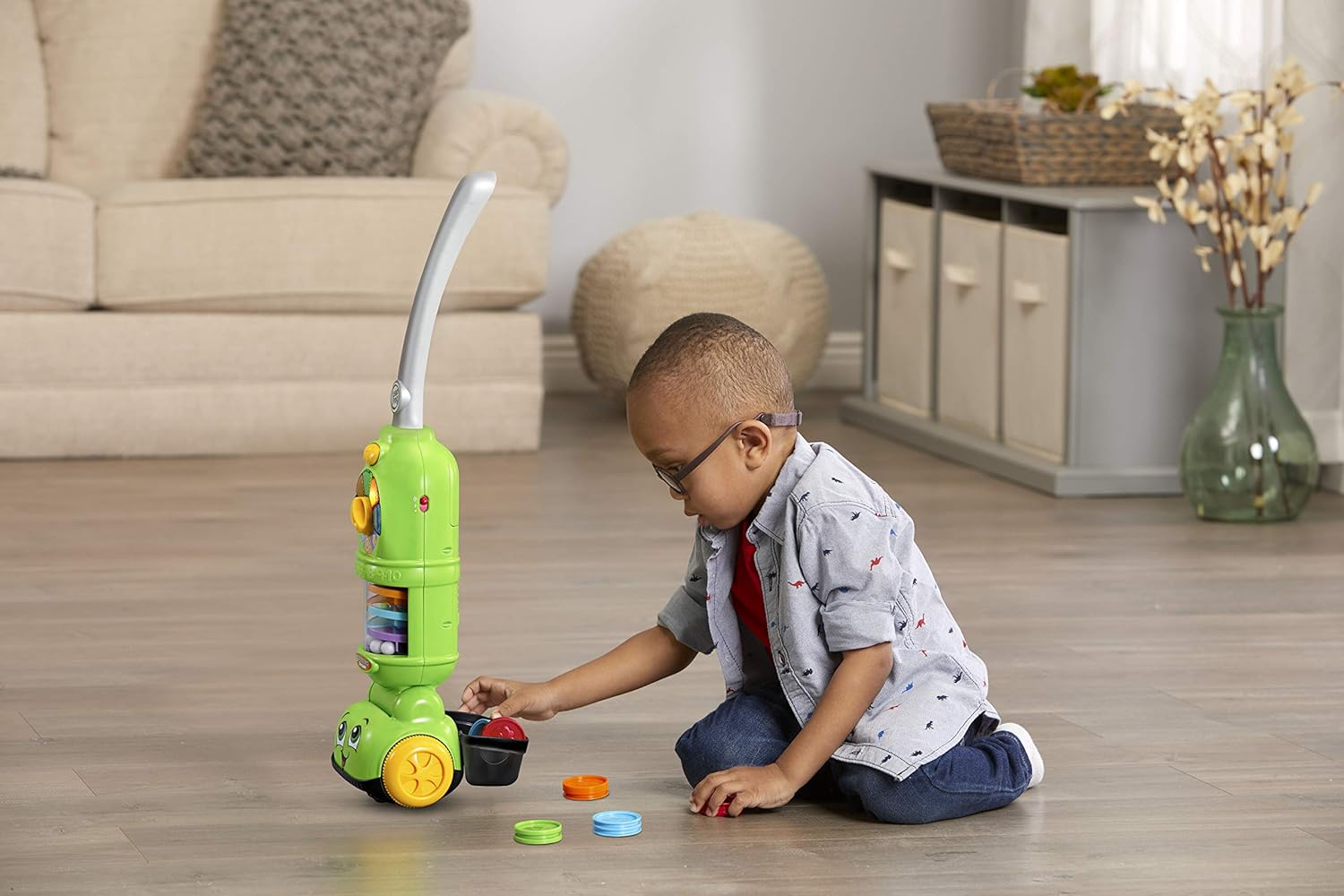LeapFrog Pick Up and Count Vacuum toy in green with accessories