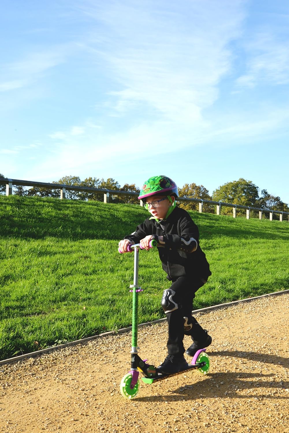 Marvel Spider-Man folding in-line scooter with green and purple wheels