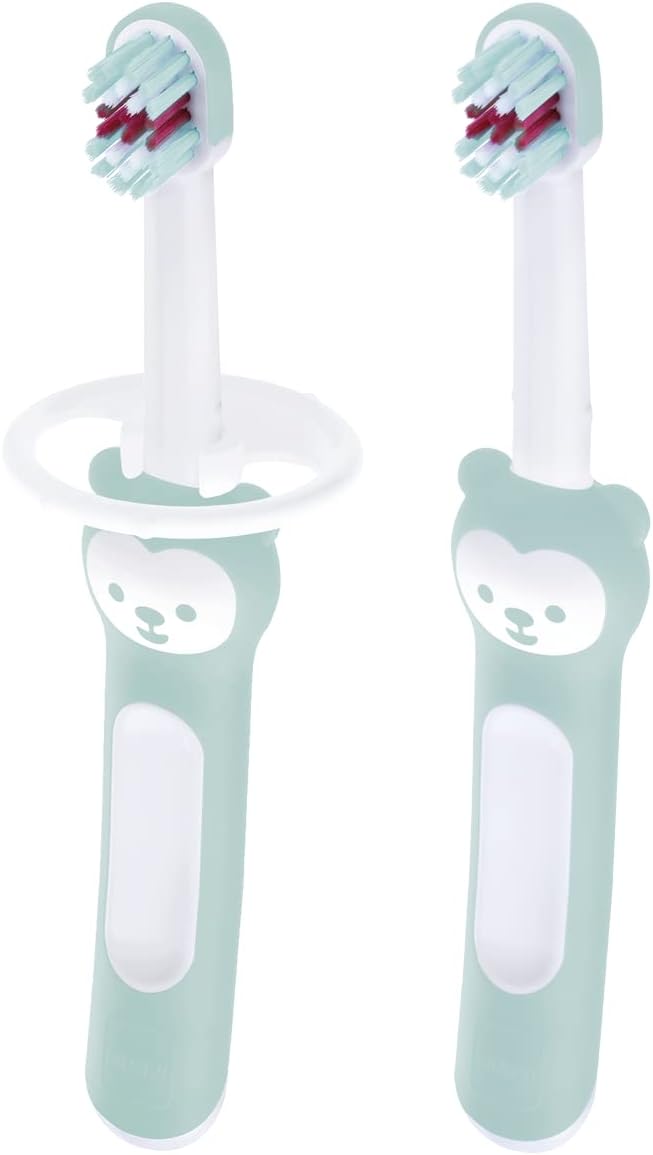 MAM baby toothbrush with safety shield in mint green, six months plus