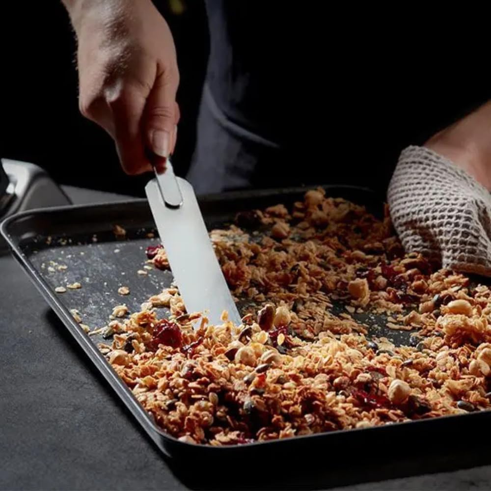 Stellar hard anodised baking tray 41cm x 29cm with baked granola and spatula