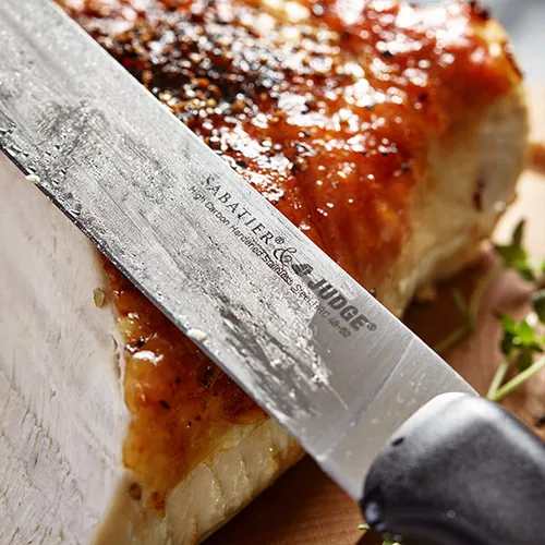 Judge Sabatier IP60 5-piece knife block set with chef knife in use