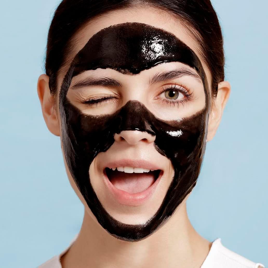 The Ordinary Salicylic Acid 2% black masque applied to face, 100ml