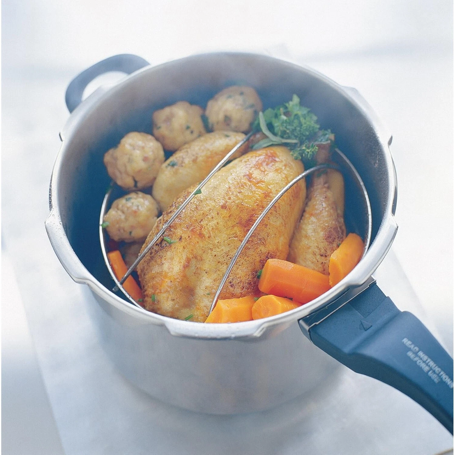 Prestige Smart Plus 6L black pressure cooker with cooked food inside