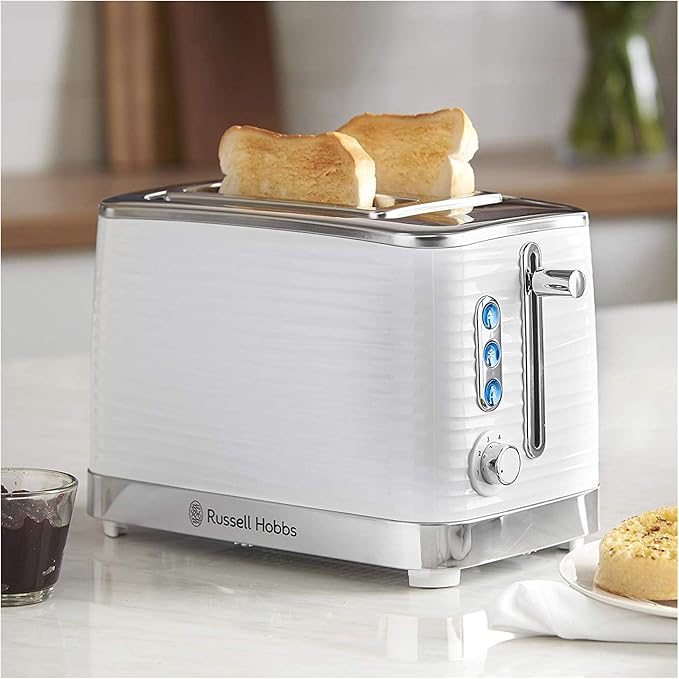 Russell Hobbs Inspire white 2-slice toaster with toasted bread inside