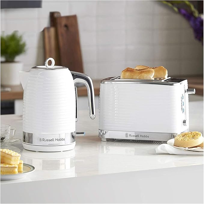 Russell Hobbs Inspire white 2-slice toaster with toast inside