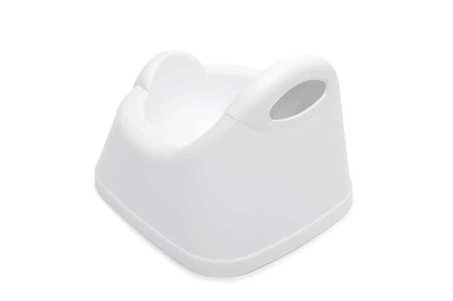The Neat Nursery Co training potty white and pink compact toddler seat