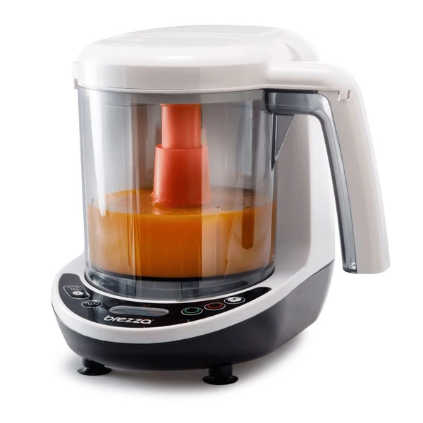 Baby Brezza Food Maker Deluxe steamer and blender with orange purée in bowl