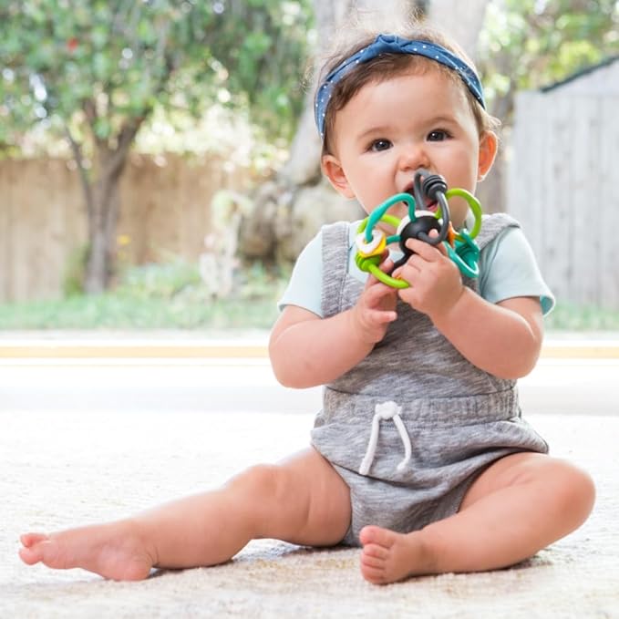 Infantino Shake and Teethe flexible rattle ball toy with teething rings